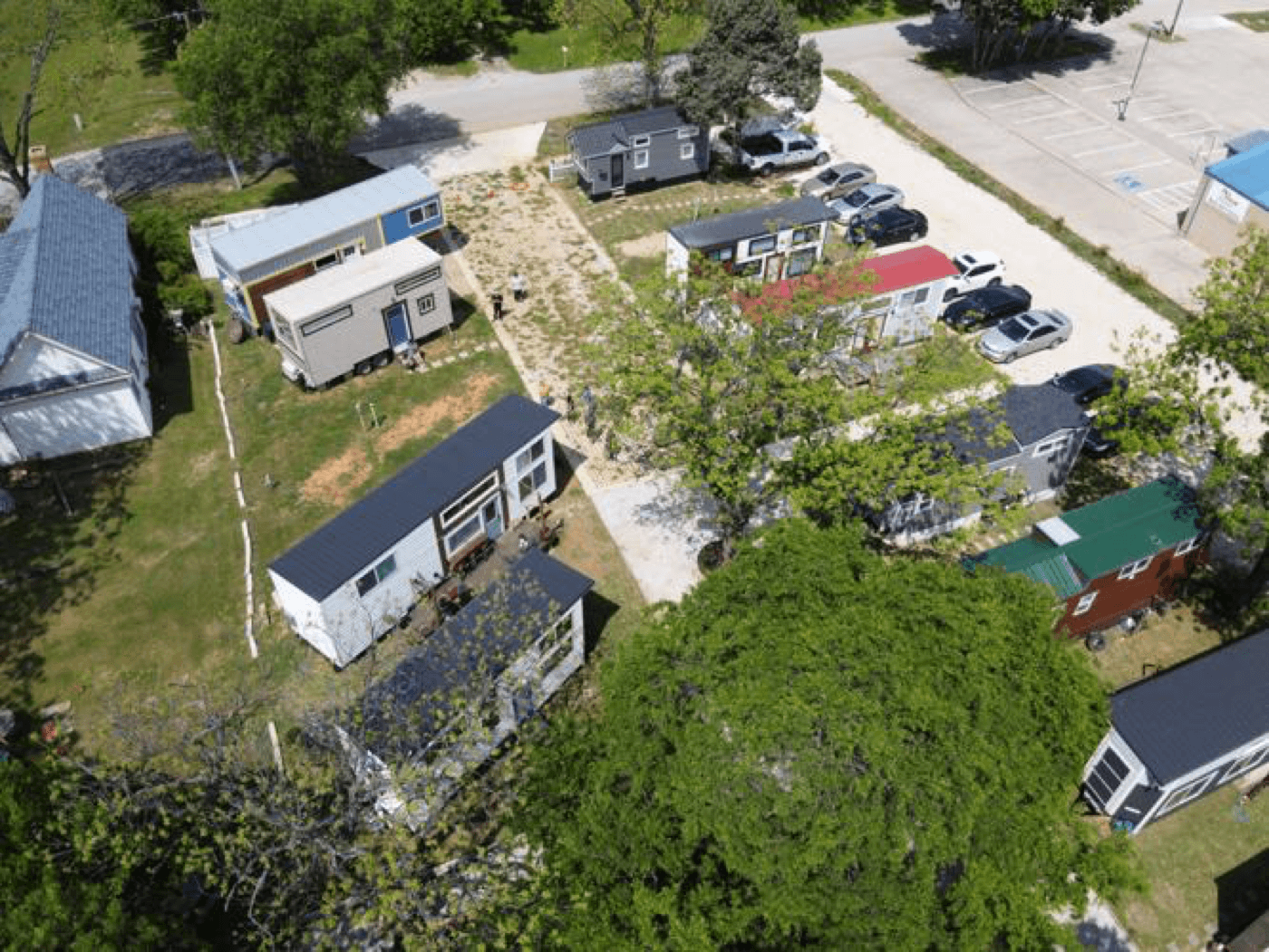 Compact urban tiny home pads along Gotcher Avenue in the Lake Dallas Tiny Home Village downtown district.