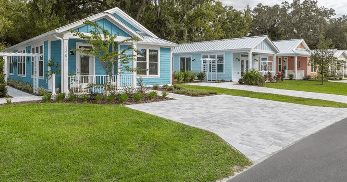Cottage-style neighborhood homes along a leafy street.